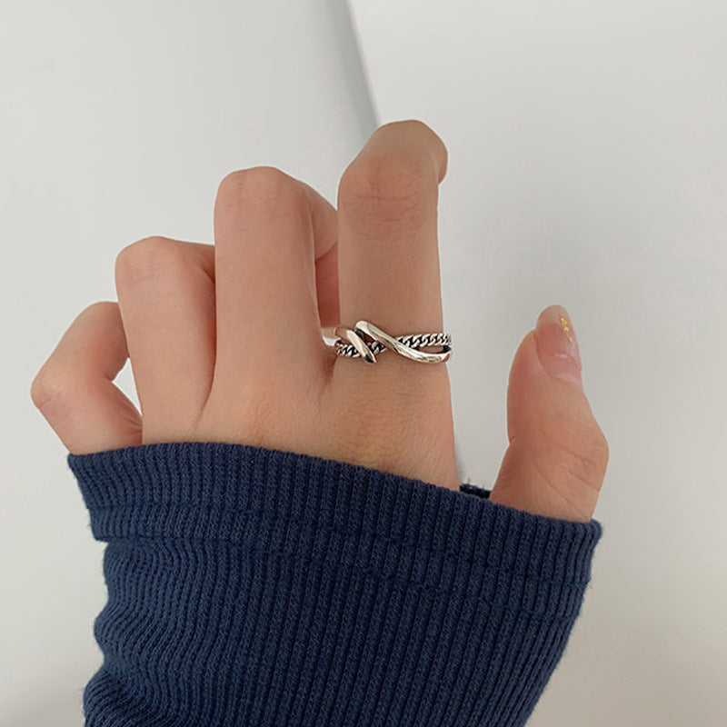 Ring aus 925er Sterlingsilber mit gedrehter Kette und offener Form