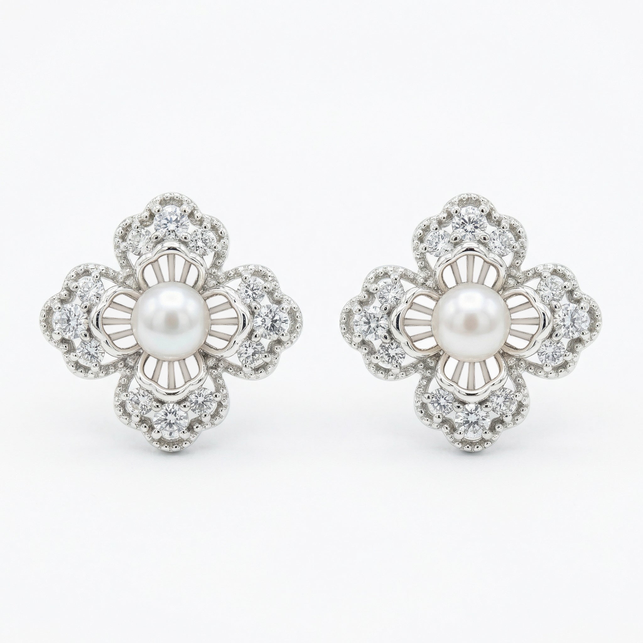 925 Sterling Silver Elegant Floral Pearl and Sparkling Accent Stud Earrings in White Metal
