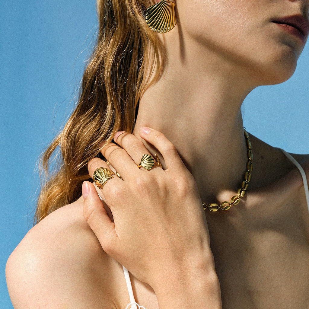 Edelstahlring mit Muschelarmband