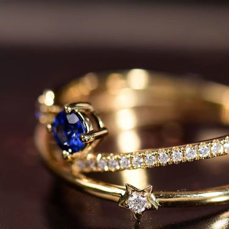 Blue Crystal Ring With Three Rows Of Diamonds