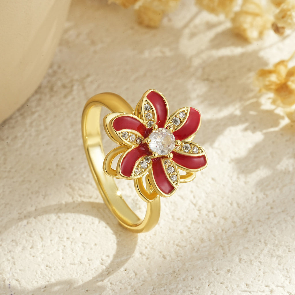 Drehbarer blumenförmiger vergoldeter Ring