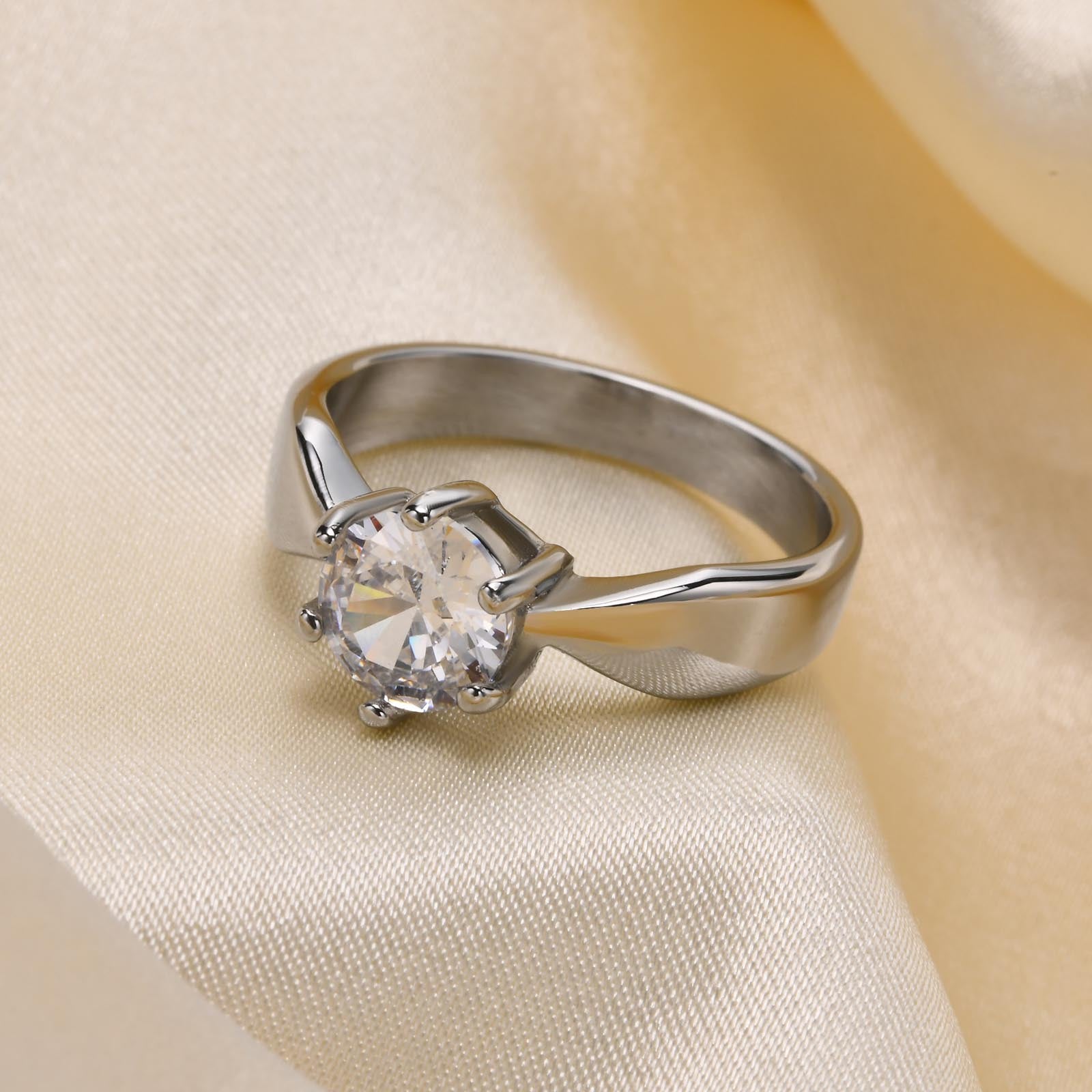 Damen Ring aus Titanstahl mit Krappenfassung und einzelnem Zirkon
