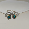 Creative Spiral-Inlaid Sapphire Earrings With Yellow Accents