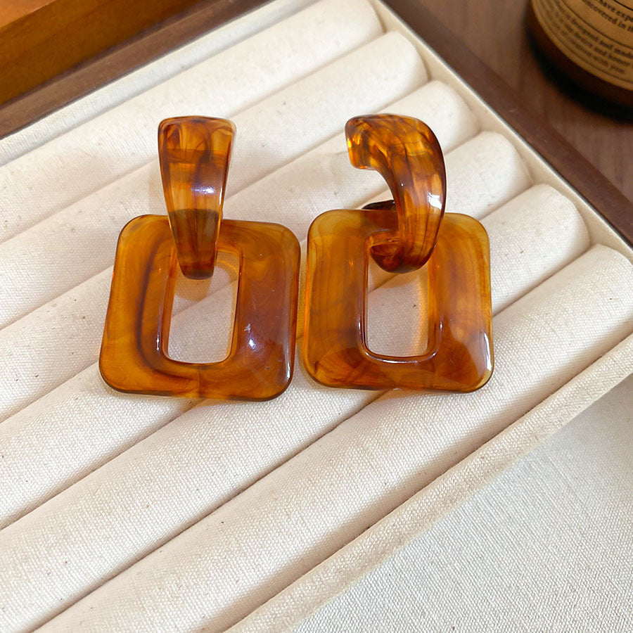 Vintage Ohrringe im Maillard-Stil aus Holz und Harz für Damen, goldfarbene gedrehte Knoten-Ohrhänger aus Harz, Retro-Luxus-Modeschmuck