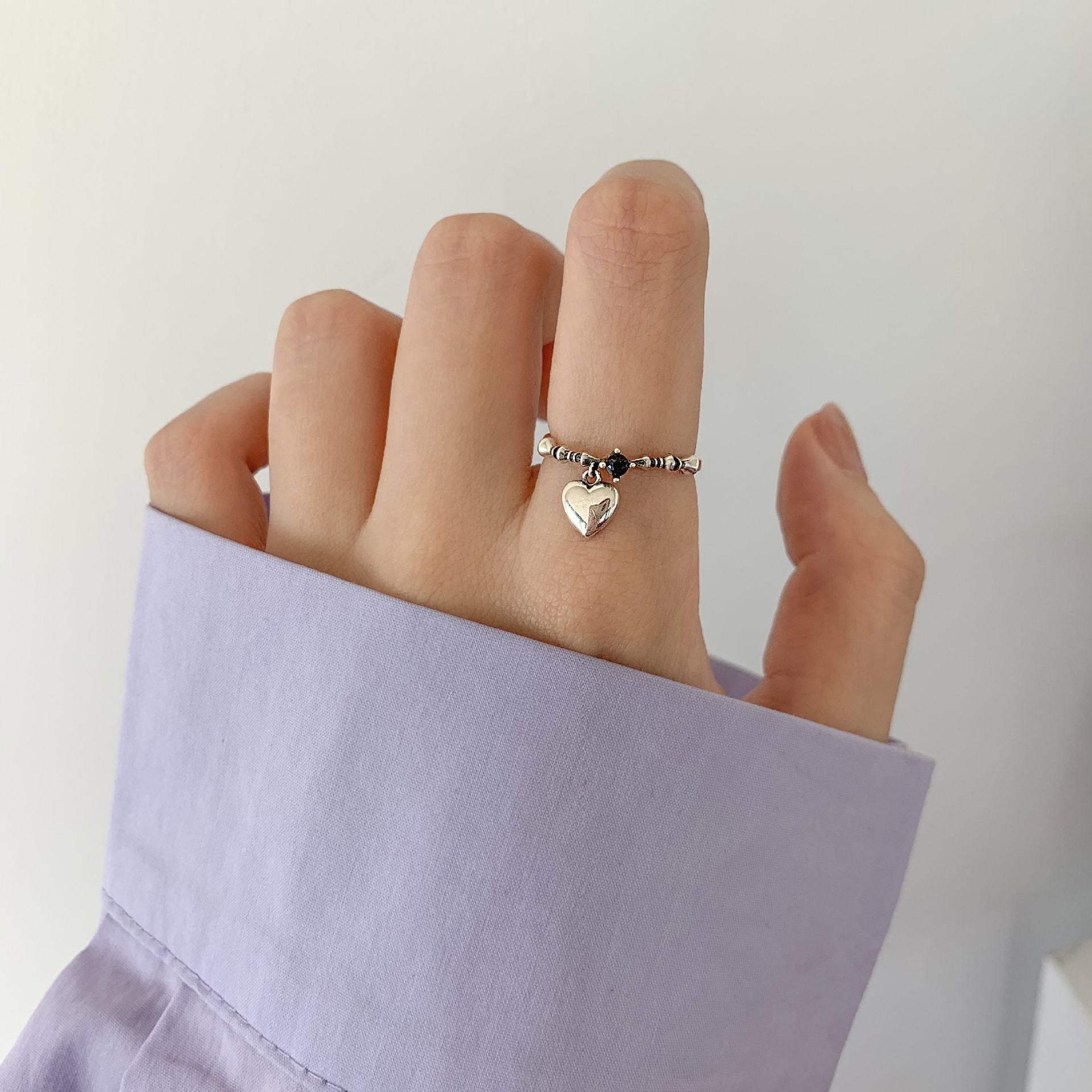 Ring aus 925er Sterlingsilber mit gedrehter Kette und offener Form