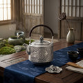 Pure 999 Fine Silver Elegant  Teapot with Handcrafted Floral Engraving, Hammered Texture, and Lotus Lid-Fine Teapot with Handle - Handicraft