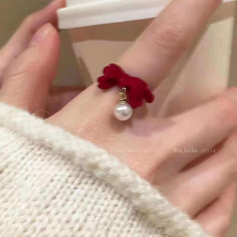 Vintage schwarzer beflockter Schleifen-Perlenanhänger offener Ring, französischer eleganter Nischen-Design verstellbarer Fingerring