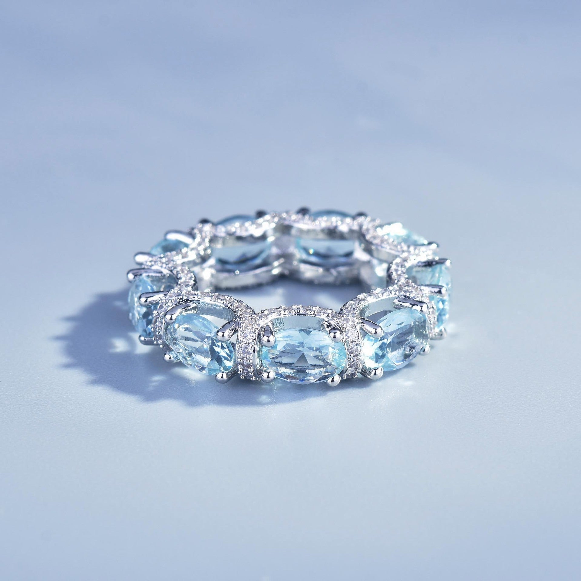 Luxury Oval Cut Aquamarine Eternity Band Ring, Micro Pave Blue Gemstone Stackable Ring For Women