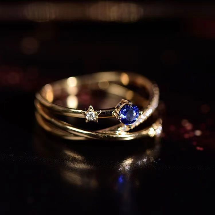 Blue Crystal Ring With Three Rows Of Diamonds