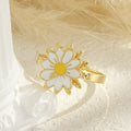 Drehbarer blumenförmiger vergoldeter Ring