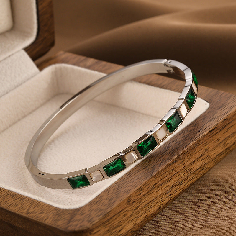 Smaragd-Diamant-Muschel-Armband aus Titanstahl für Damen