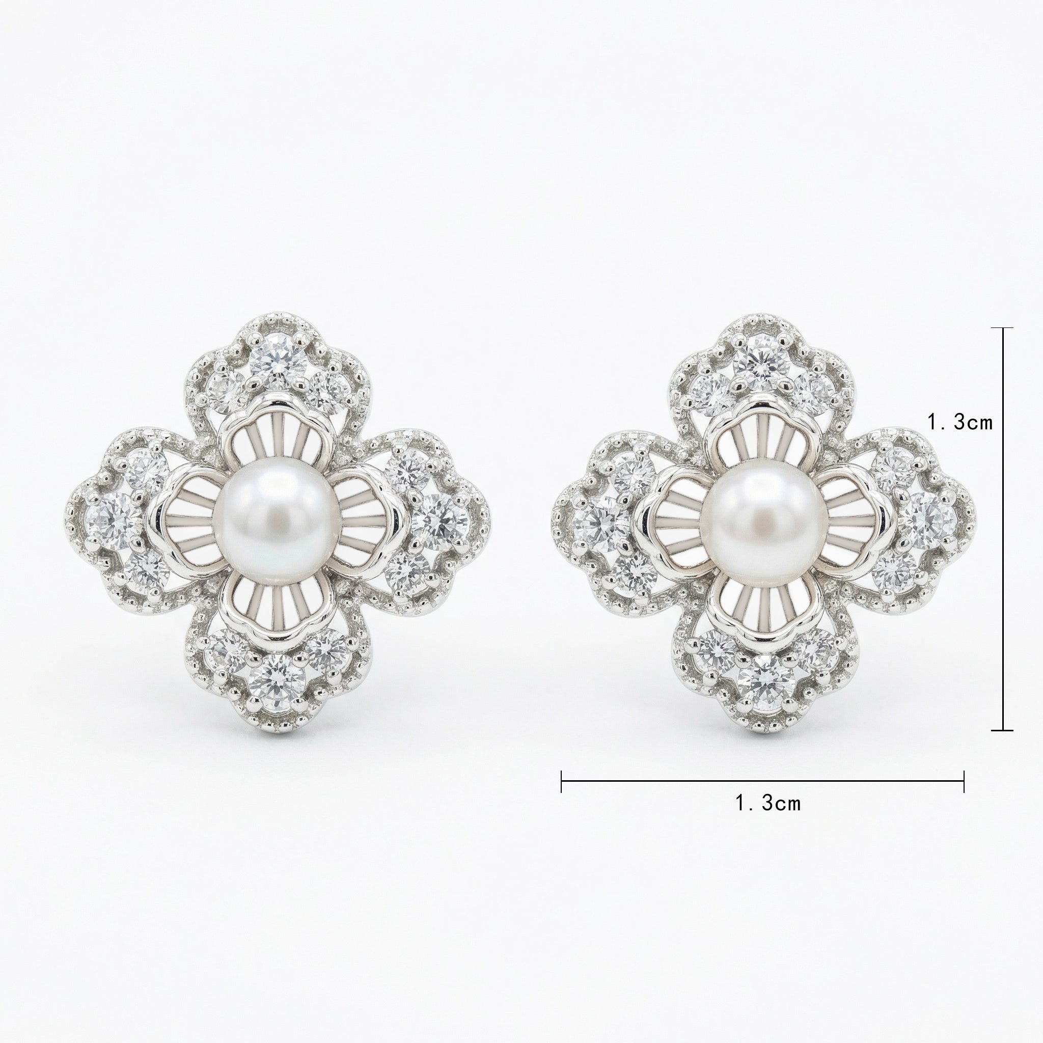 925 Sterling Silver Elegant Floral Pearl and Sparkling Accent Stud Earrings in White Metal