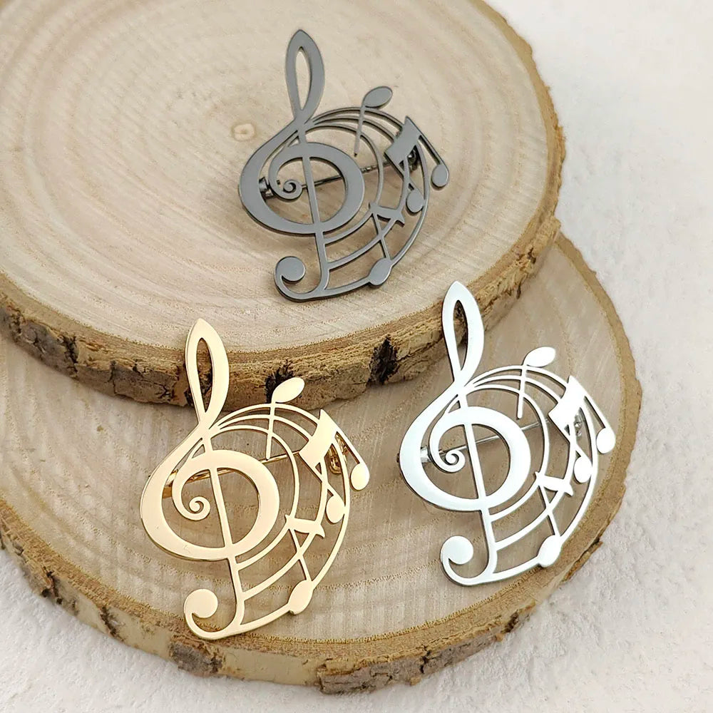 Creative punk style hollow music symbol stainless steel gold-plated 18K brooch, black suit accessories, wedding matching set