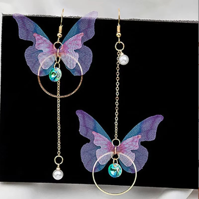 Elegantes pendientes de mariposa de cristal morado con borla larga para mujer, delicados pendientes de insectos de cristal con diamantes de imitación, joyería de lujo para fiestas