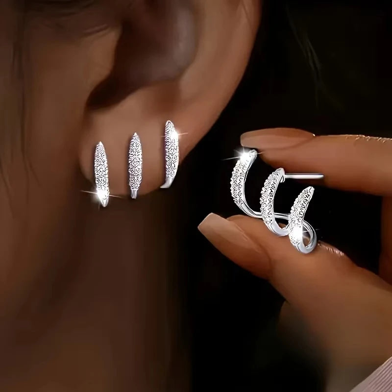 Exquisite silberfarbene Krallenfassungs-Ohrstecker mit Kristall Modernes Design Vielseitige Mode-Accessoires Damen Schmuck