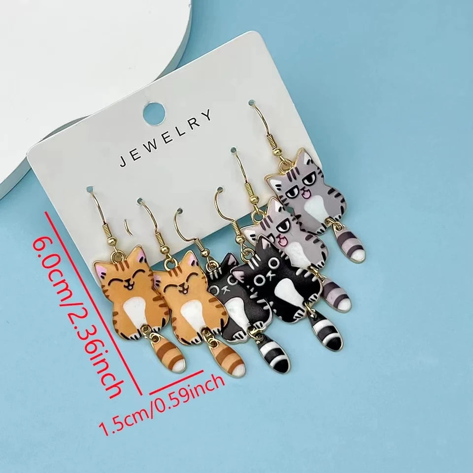 3 Paar neue lustige und niedliche Emaillierte Legierung Hängende Schwanz Katze Ohrringe Farbige Katzenohr Schmuckset Schönes Geschenk für Frauen Mädchen