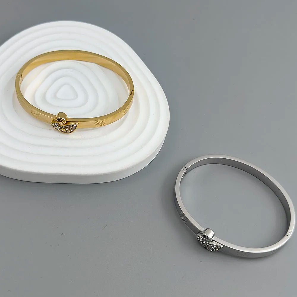 Neues Schwan Zirkon vergoldetes Edelstahlarmband 18K, hochwertiges wasserdichtes Pärchenarmband, Frauengeschenk