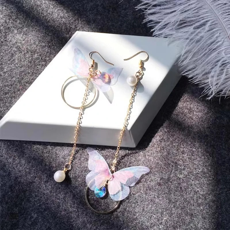 Elegantes pendientes de mariposa de cristal morado con borla larga para mujer, delicados pendientes de insectos de cristal con diamantes de imitación, joyería de lujo para fiestas