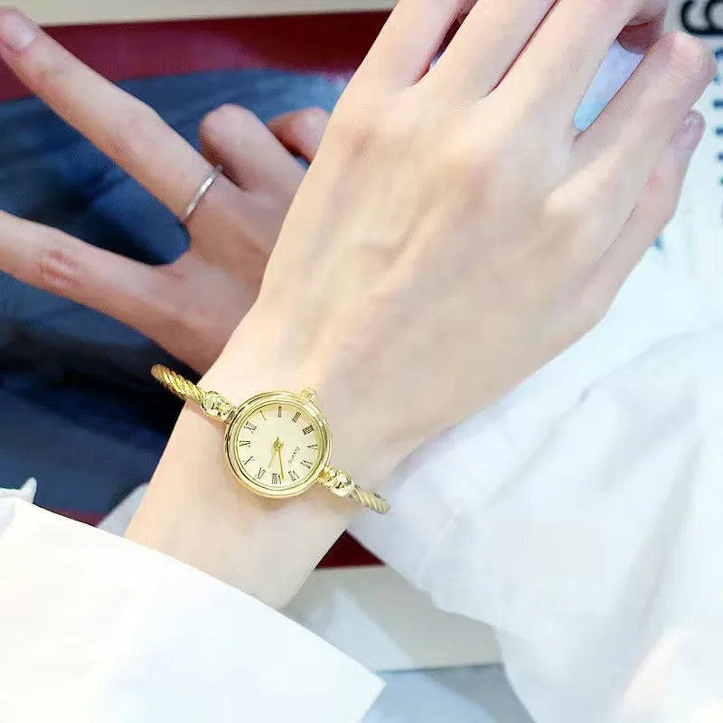 YIKAZE Damenuhren, kleine goldene Armreifuhr, Edelstahl, Retro-Damenuhr, Quarz-Armbanduhr, modische Kleideruhr