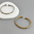 Original doppelreihiges Edelstahl-Drahtarmband in Kreuzform, vergoldet, wasserdicht und rostfrei, Paararmband
