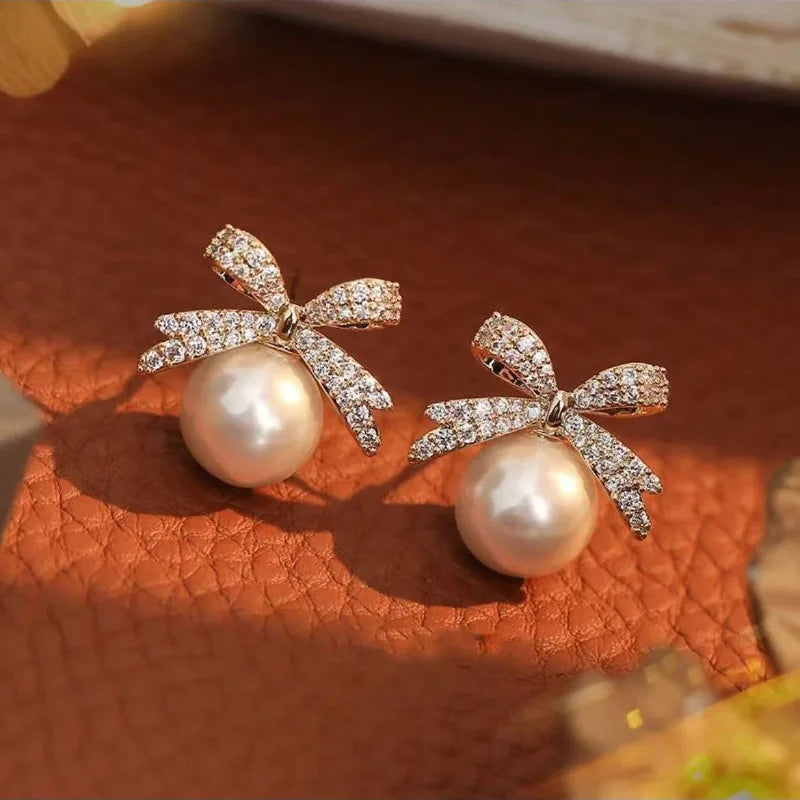 French Sweet Personality Pearl Simple And Small Design Sense Full Of Drill Bow Delicate All-matching Earwear Female