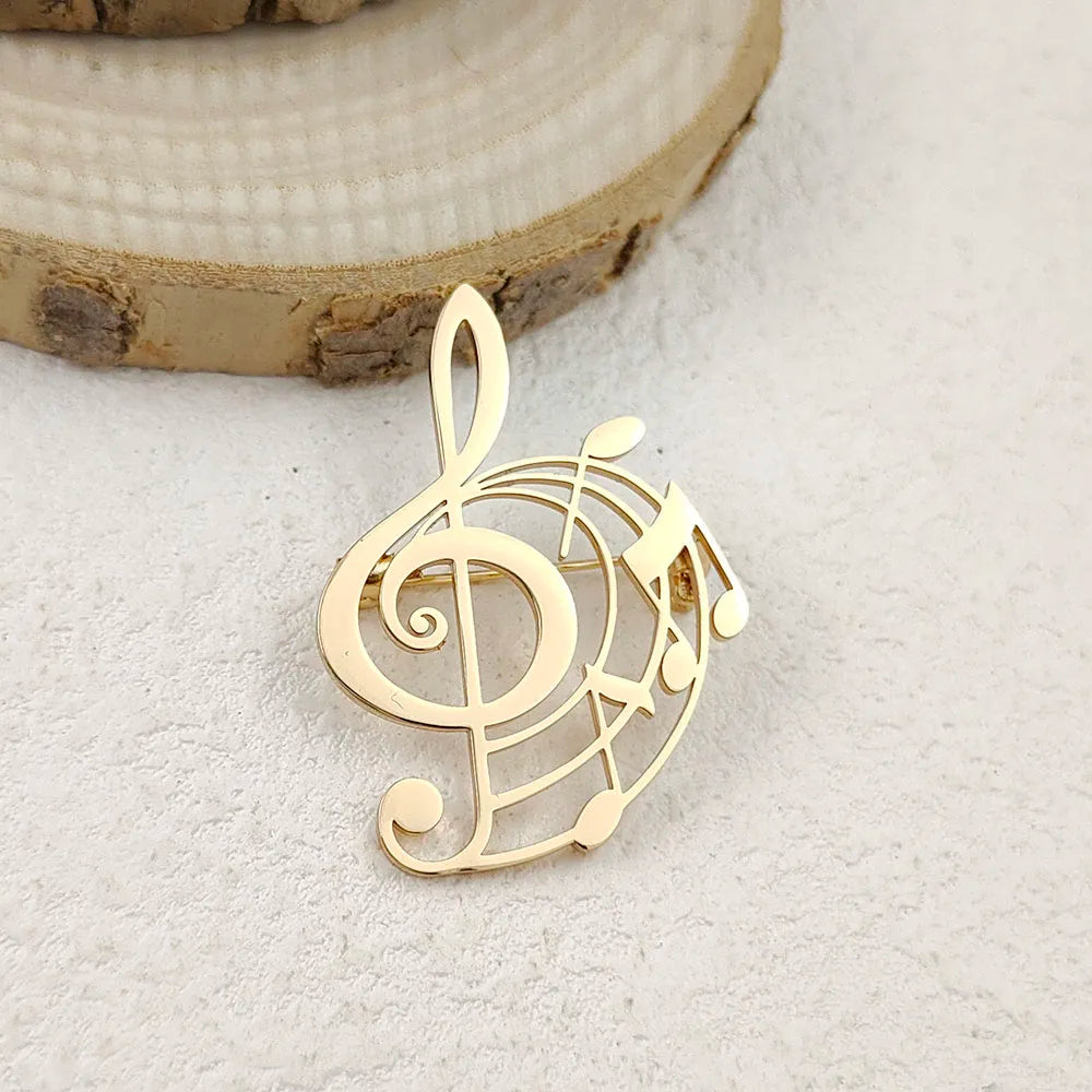 Creative punk style hollow music symbol stainless steel gold-plated 18K brooch, black suit accessories, wedding matching set