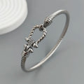 Neues Armband aus Stahldraht mit Knopfmuster, Hufeisen, vergoldet, Edelstahl, 18K, hochwertiges, wasserdichtes Paar-Armband, Frau