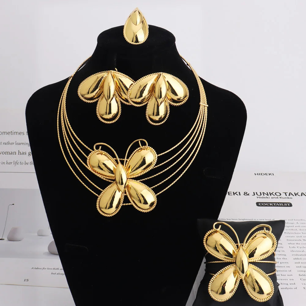 Dubai Luxuriöser Schmuck 4-teiliges Damen-Mode-Set mit trendigen Blumenohrringen, Anhängerkette, Armband, vergoldeter Schmuck, Partygeschenke