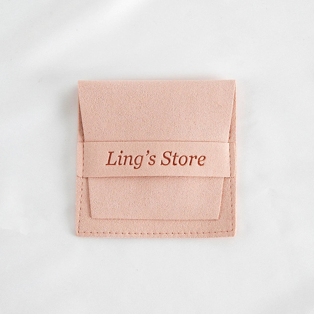 50/100 Stück schicke individuelle Logo Schmuck Microfaser Streifen Tasche Rose Beige Rosa Umschlag Samt Ring Ohrring Anhänger Halskette Ohrstecker Beutel