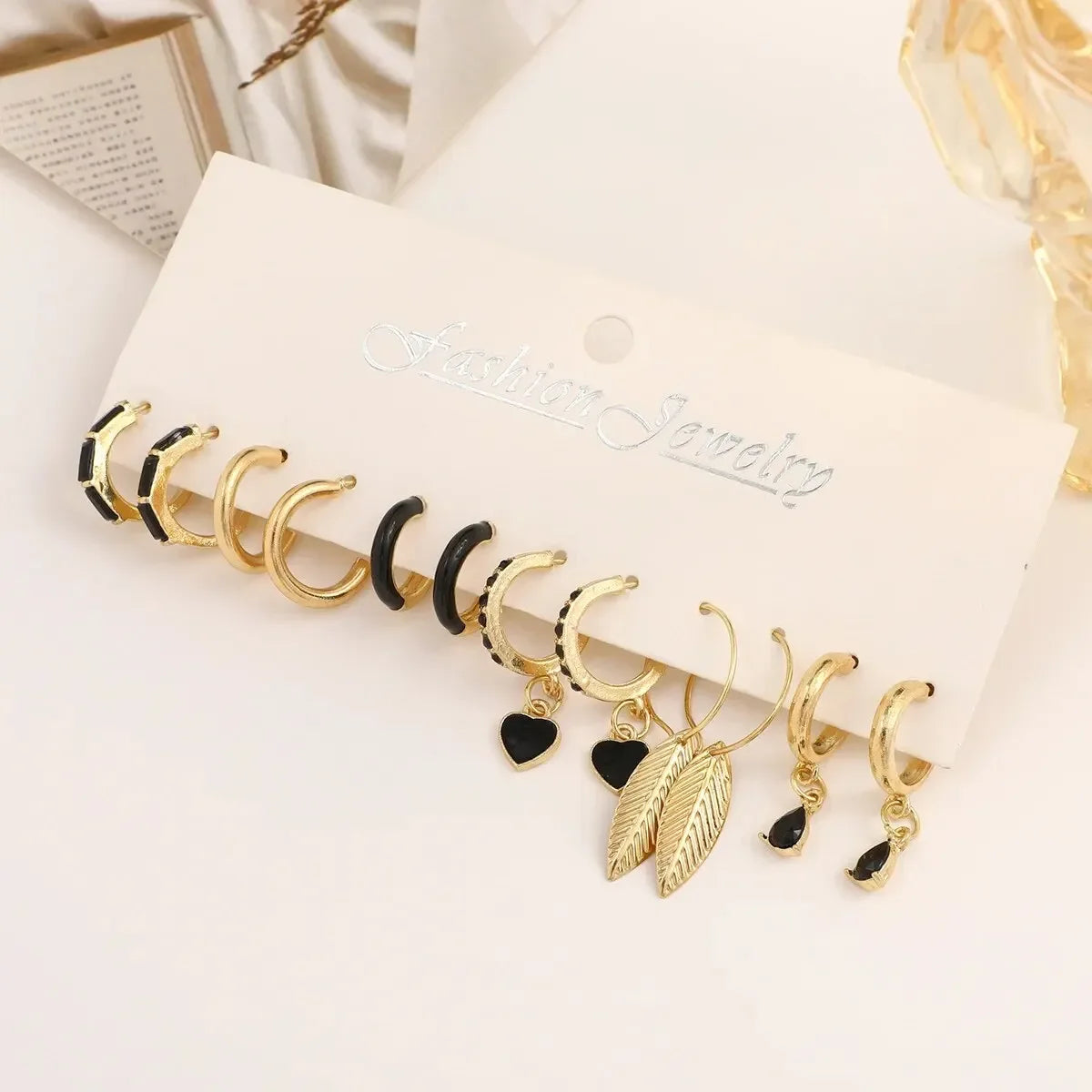 Einfaches 11-teiliges Set schwarze Herz-Blatt-Schmetterlings-Ohrringe für Damen, Mode, Temperament, Creolen, Urlaub, Hochzeit, Schmuckgeschenk