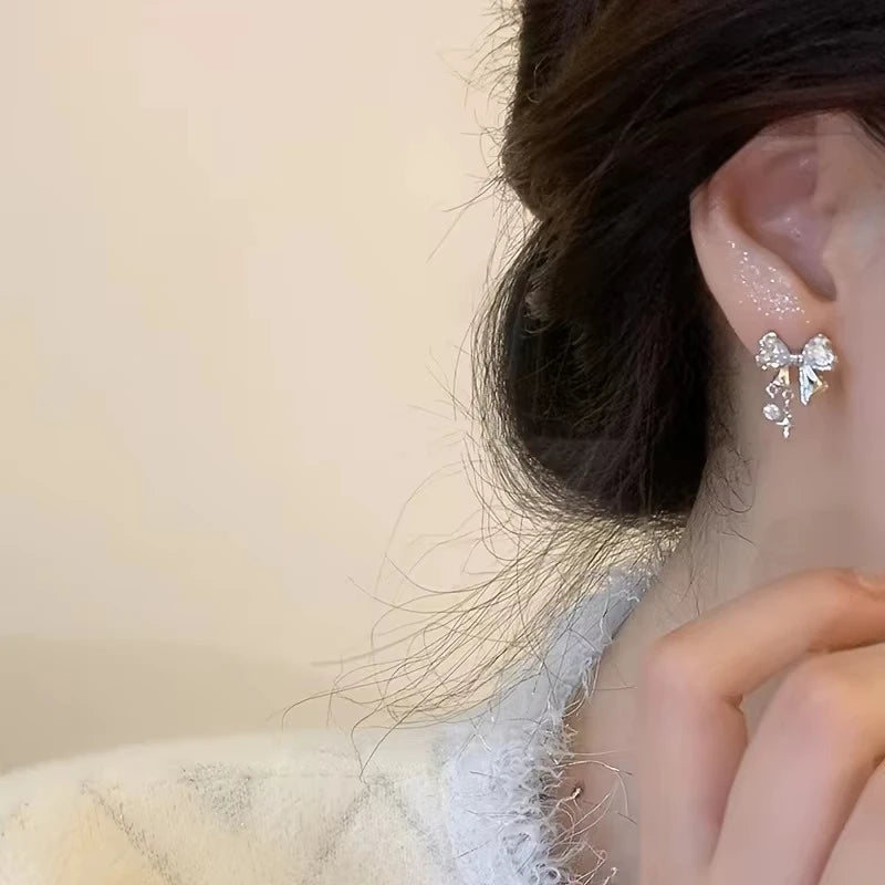 Neue Y2K Schleifen-Zirkonia-Ohrstecker für Damen, modische koreanische, silberfarbene rosa Kristall-Personalitäts-Ohrringe, Party-Schmuckgeschenke