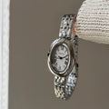 Reloj de moda Hot Sale para mujer, estilo de la antigua Roma, esfera ovalada, reloj pequeño dorado, correa de acero ajustable, reloj de pulsera de cuarzo al por mayor