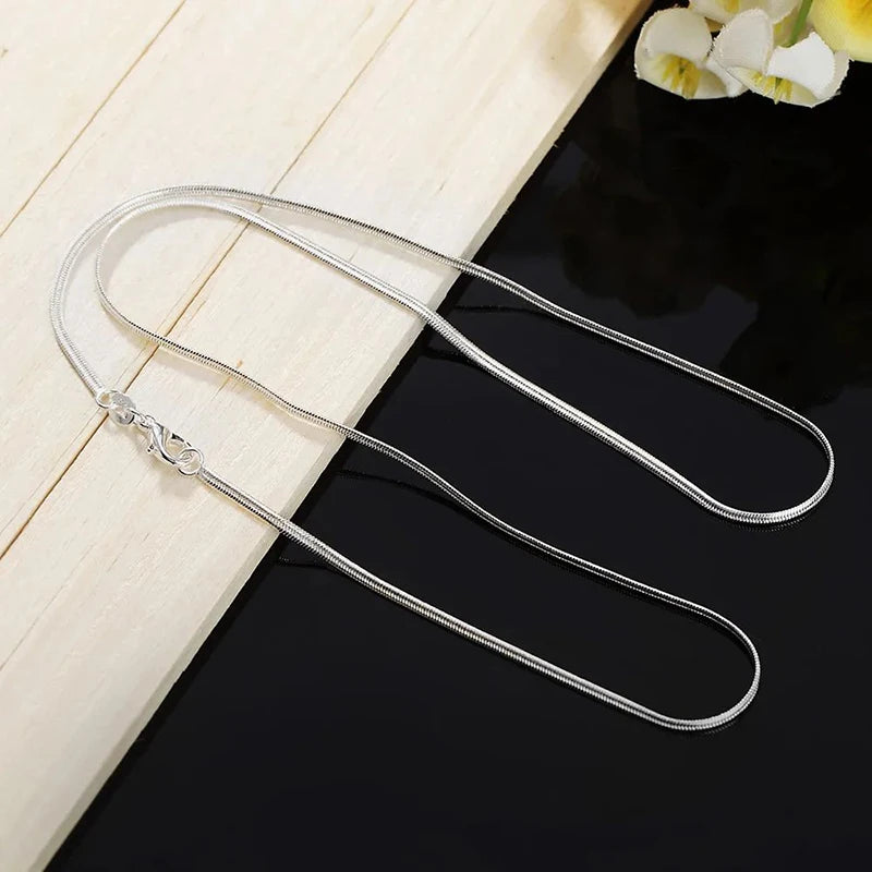 Cadena de Plata de Ley 925 para Collar de 16-30 pulgadas y 2 mm, dijes para fiesta de bodas, cadena plana de serpiente, linda para mujeres y hombres, moda para colgante