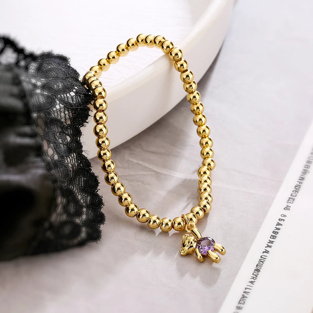 NEWBUY Trendige Goldfarbene Kupferperlen Armbänder für Frauen Weiß/Rosa/Lila Zirkonia Süße Bär Schmuck