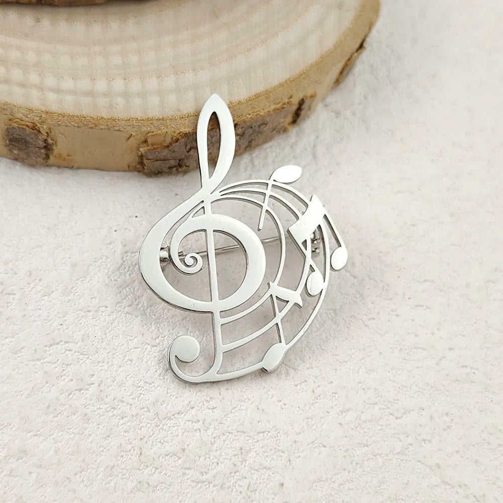 Creative punk style hollow music symbol stainless steel gold-plated 18K brooch, black suit accessories, wedding matching set