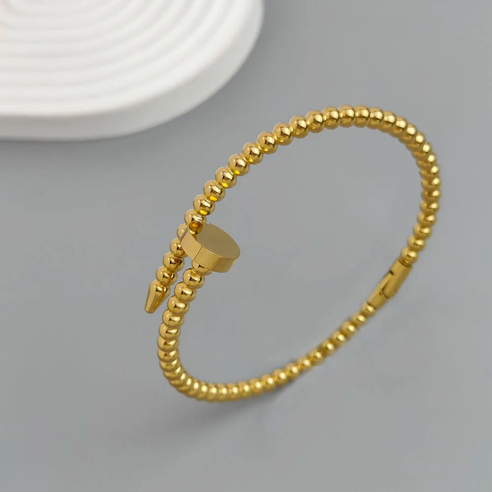 Schlichtes Armband aus rundem Perlen-Nagel, vergoldeter Edelstahl, Damenarmband, wasserdichtes und rostfreies Armband, von Paaren getragen