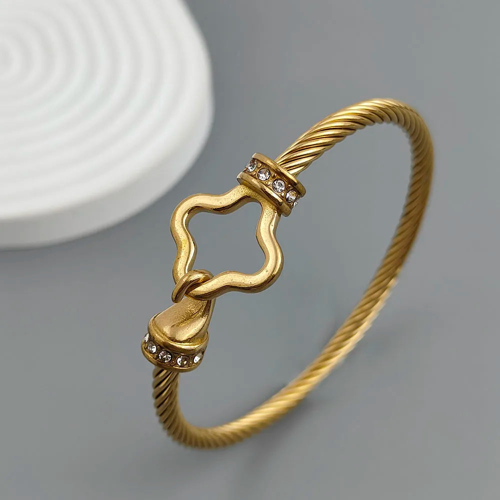 Neues Stahlseil-Knopf-Zirkon-Kleeblatt-vergoldetes Armband 18K, hochwertiges wasserdichtes Partnerarmband, Ehefrau-Geschenk