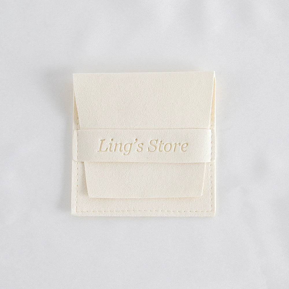50/100 Stück schicke individuelle Logo Schmuck Microfaser Streifen Tasche Rose Beige Rosa Umschlag Samt Ring Ohrring Anhänger Halskette Ohrstecker Beutel