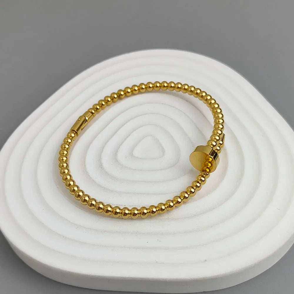 Schlichtes Armband aus rundem Perlen-Nagel, vergoldeter Edelstahl, Damenarmband, wasserdichtes und rostfreies Armband, von Paaren getragen