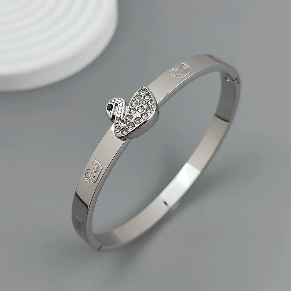 Neues Schwan Zirkon vergoldetes Edelstahlarmband 18K, hochwertiges wasserdichtes Pärchenarmband, Frauengeschenk