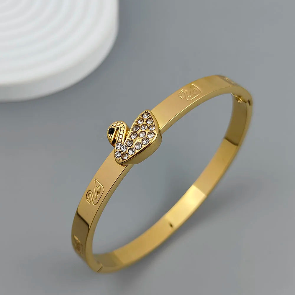 Neues Schwan Zirkon vergoldetes Edelstahlarmband 18K, hochwertiges wasserdichtes Pärchenarmband, Frauengeschenk