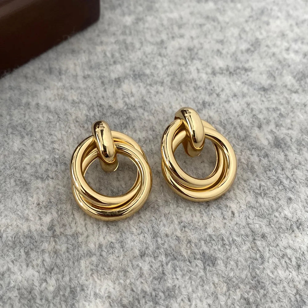 Minimalismus Persönlichkeit Metall Ohrhänger für Frauen Blatt Rund Wassertropfen Schmetterling Twist Metall Ohrringe Geometrie Schmuck