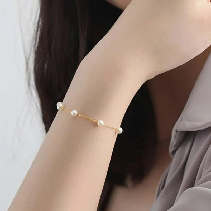 Neues schlichtes Imitationsperlenketten-Armband für Damen, modisches Temperament, goldfarbenes Kettenarmband, Party-Handschmuck