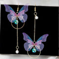 Elegante lila Glas-Schmetterling lange Quasten-Ohrringe für Damen Zarte Strass-Kristall-Insekten-Ohrringe Luxuriöser Party-Schmuck