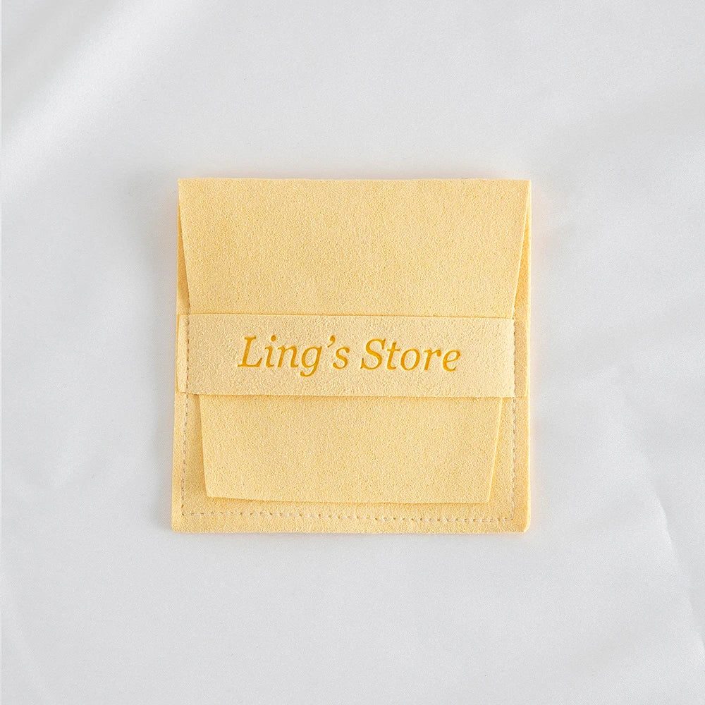 50/100 Stück schicke individuelle Logo Schmuck Microfaser Streifen Tasche Rose Beige Rosa Umschlag Samt Ring Ohrring Anhänger Halskette Ohrstecker Beutel