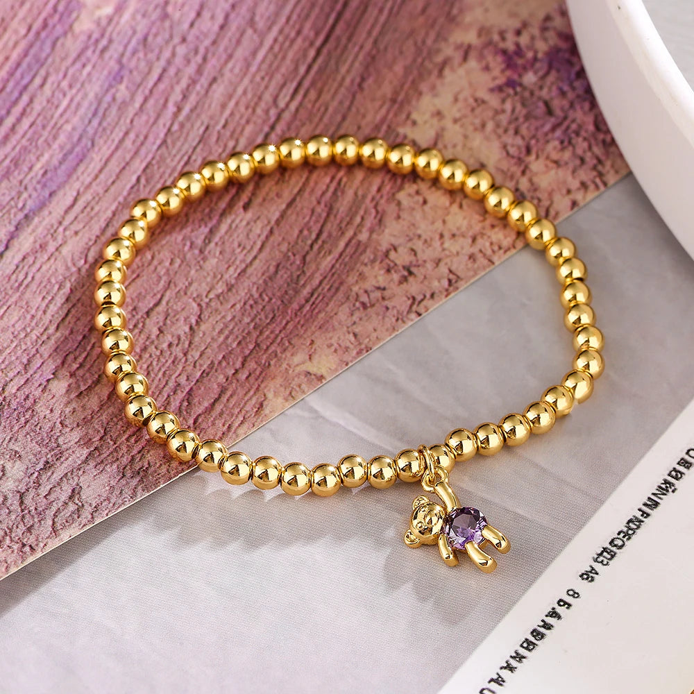 NEWBUY Trendige Goldfarbene Kupferperlen Armbänder für Frauen Weiß/Rosa/Lila Zirkonia Süße Bär Schmuck