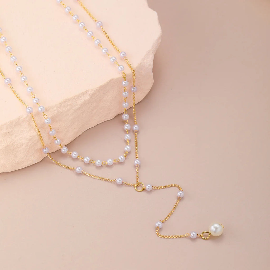 Gargantilla coreana de moda con perlas de imitación, doble capa, colgante de cuentas de bola grande, collar con borlas, joyería corporal sexy para mujer