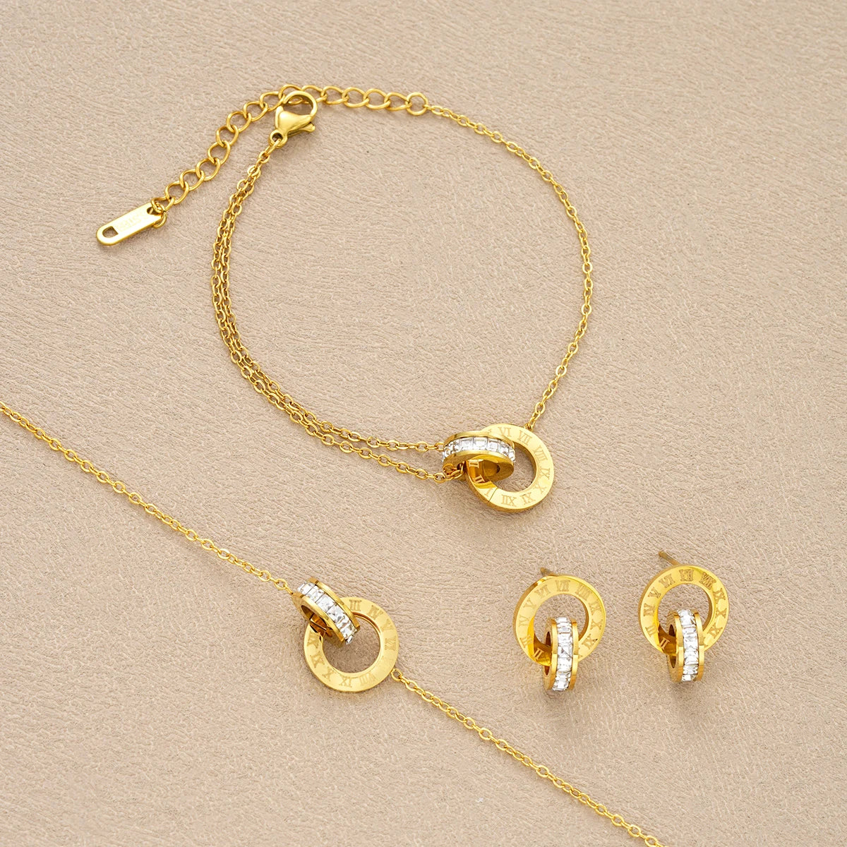 4-teiliges Set Goldfarbene Edelstahl-Kristallkette Armband Ohrringe für Frauen Ineinandergreifende Kreise Römische Ziffern Schmucksets