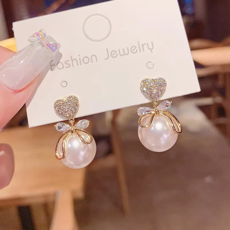 Aretes colgantes coreanos en forma de corazón para mujer, niña, regalo romántico de San Valentín, joyería de moda, perlas colgantes, aretes bonitos con lazo