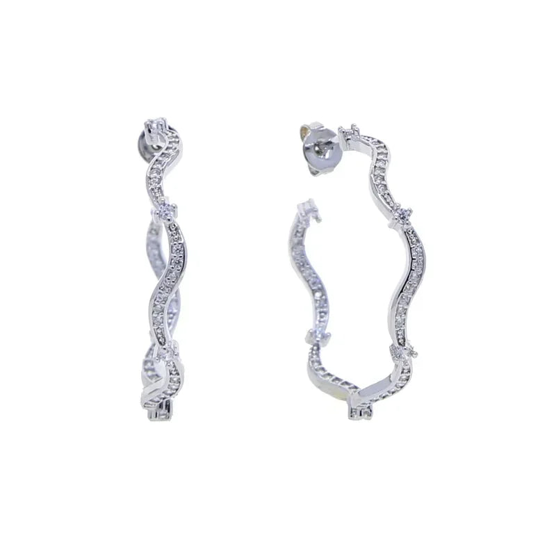 Modisches Damen-Schmuckset mit Wellenband-Armreif, Ring, Ohrringen und Halskette mit 5A Zirkonia CZ in Micro-Pavé-Fassung